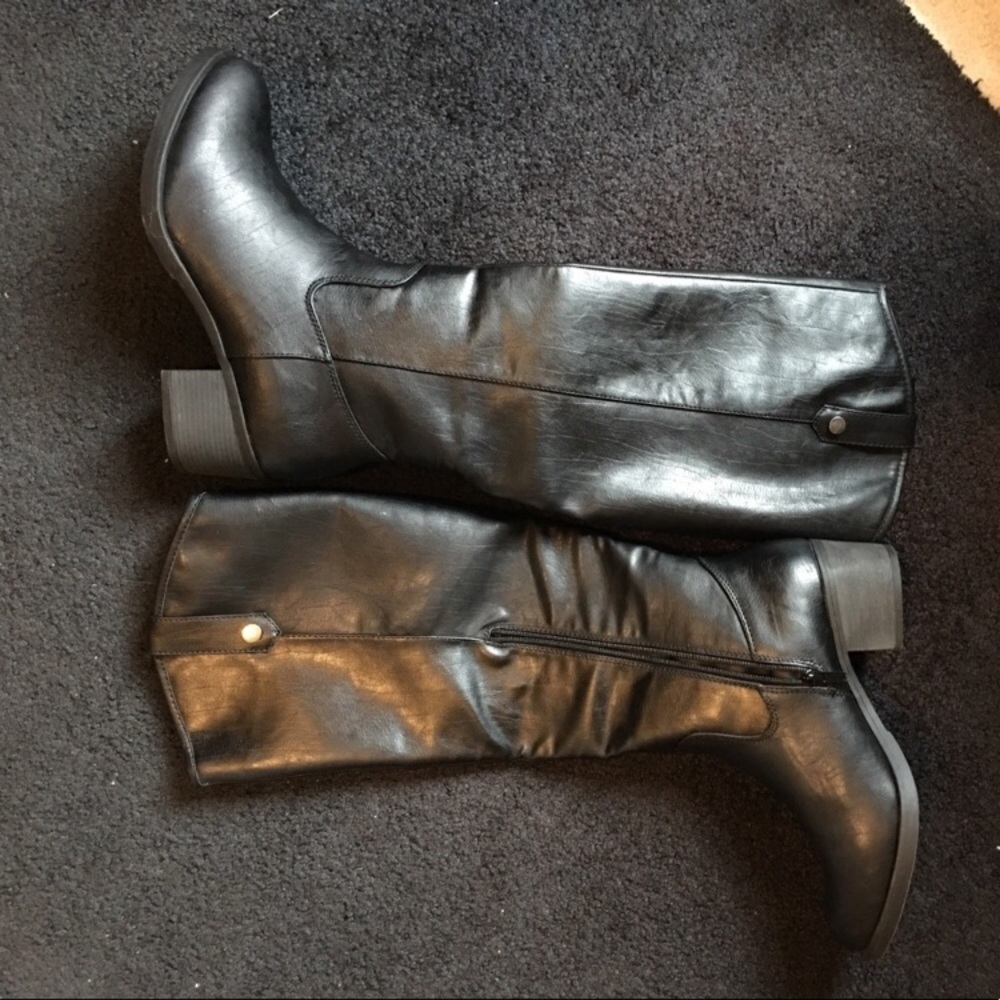 Tall black riding boot
